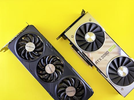 Two modern graphics cards on a bright yellow background, highlighting technology and design.