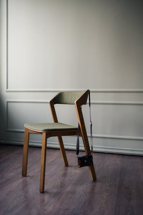 Camera Hanging on Chair · Free Stock Photo