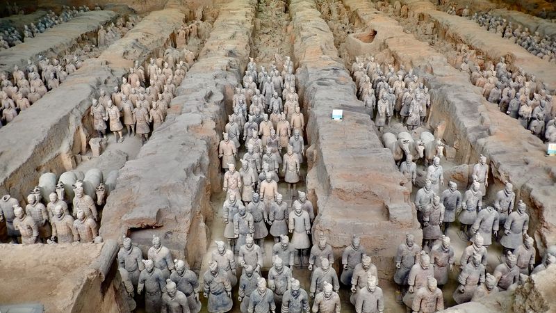 Rows of terracotta warrior statues in the excavation pit