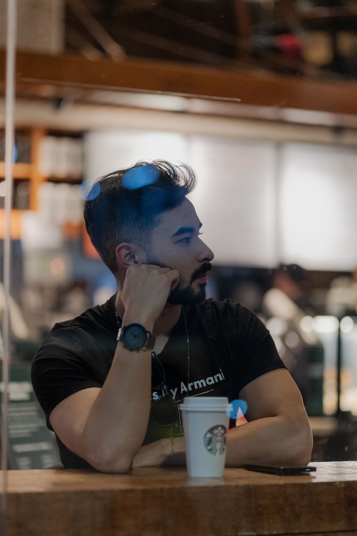 Person relaxing with coffee representing semi-passive income from the Lazy Money Method