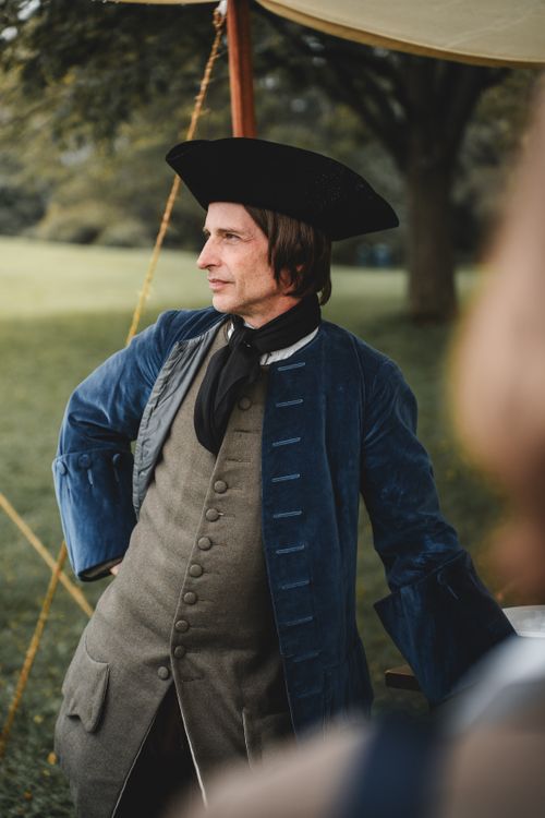 Free A man in period costume participates in a historical reenactment outdoors in Québec, Canada. Stock Photo