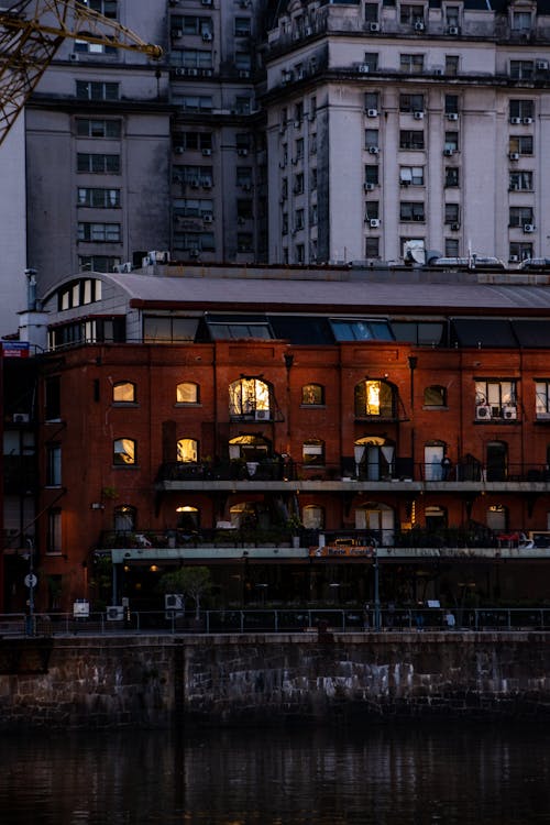 Illuminated Warehouse by Sea