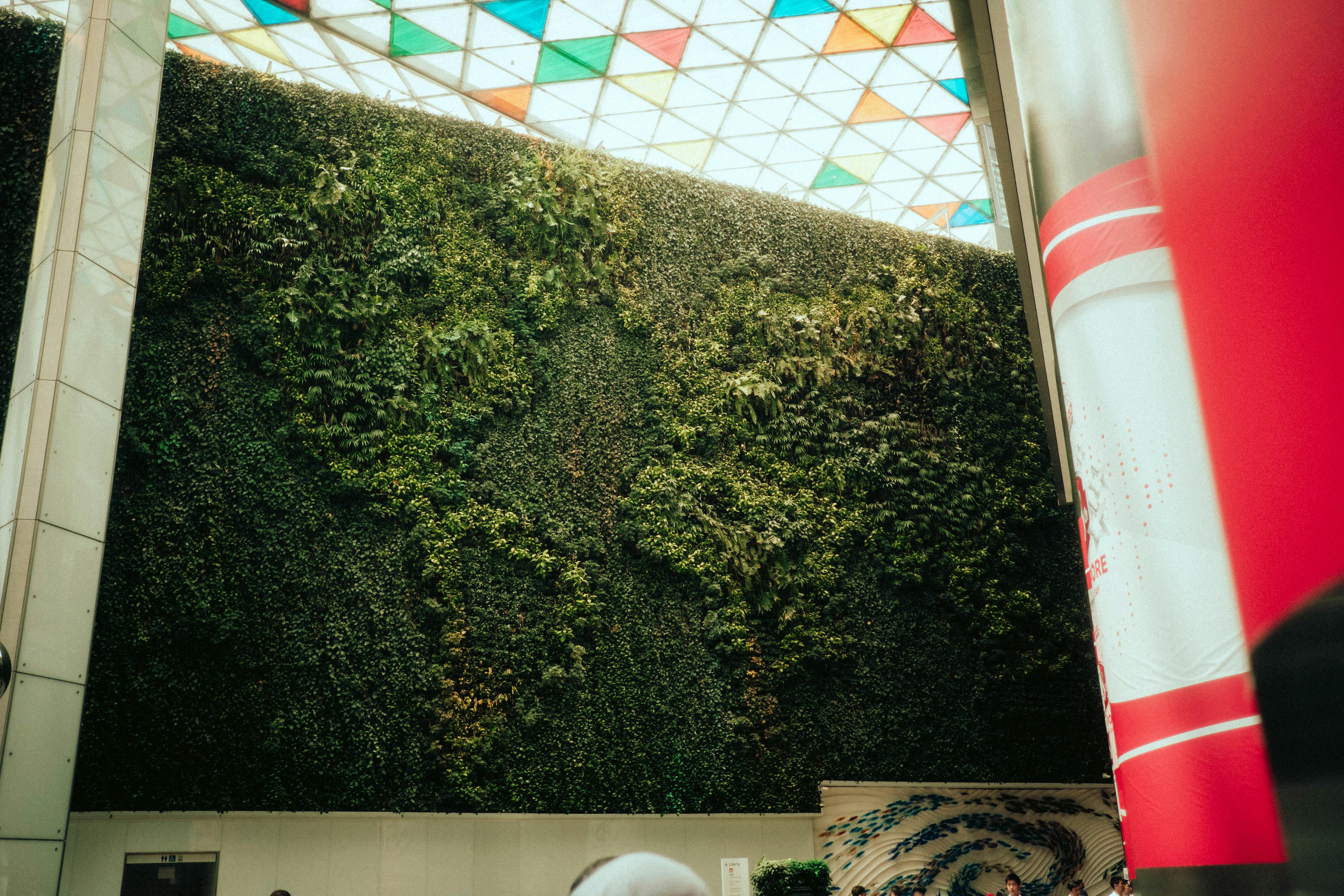 green wall with world map at ocean financial centre in singapore