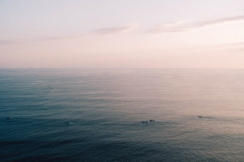 Kostenloses Stock Foto zu boote, dämmerung, horizont