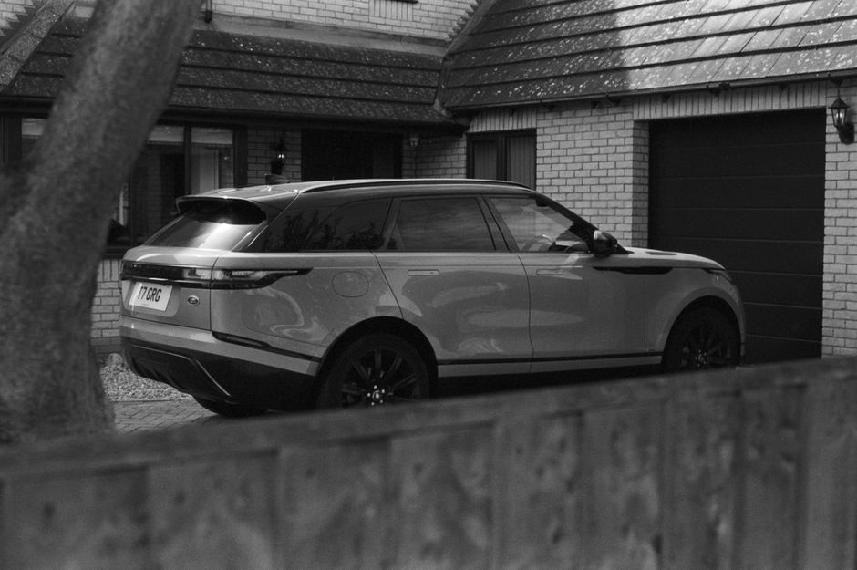 family SUV parked in a driveway
