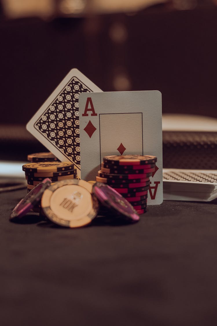 Casino Tokens And Playing Cards