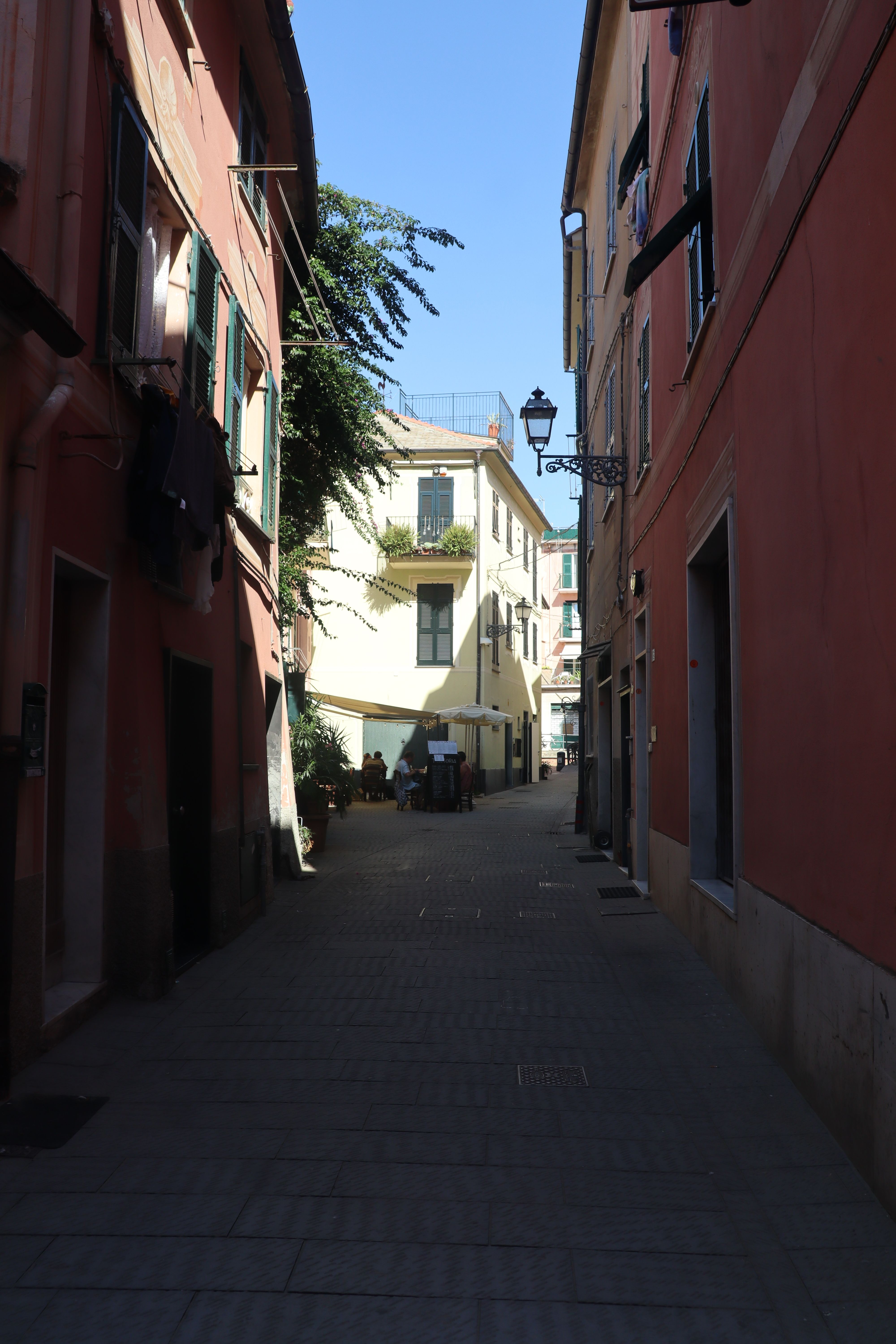 Narrow Street between Buildings · Free Stock Photo
