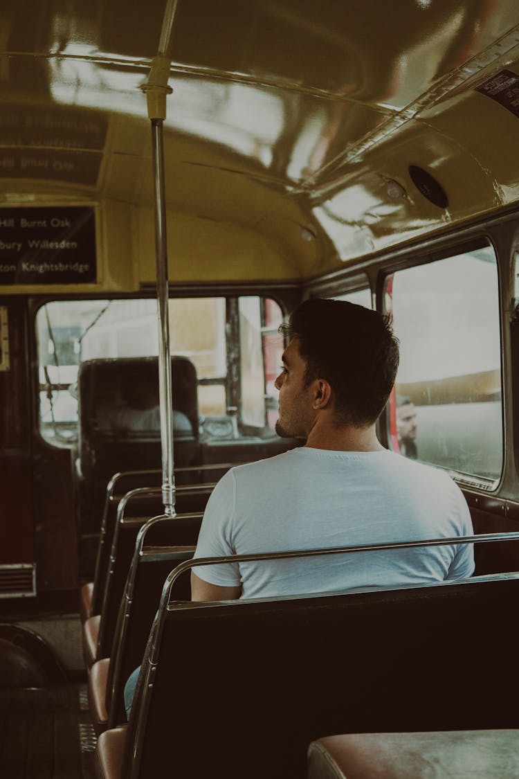 Man Travelling In Bus