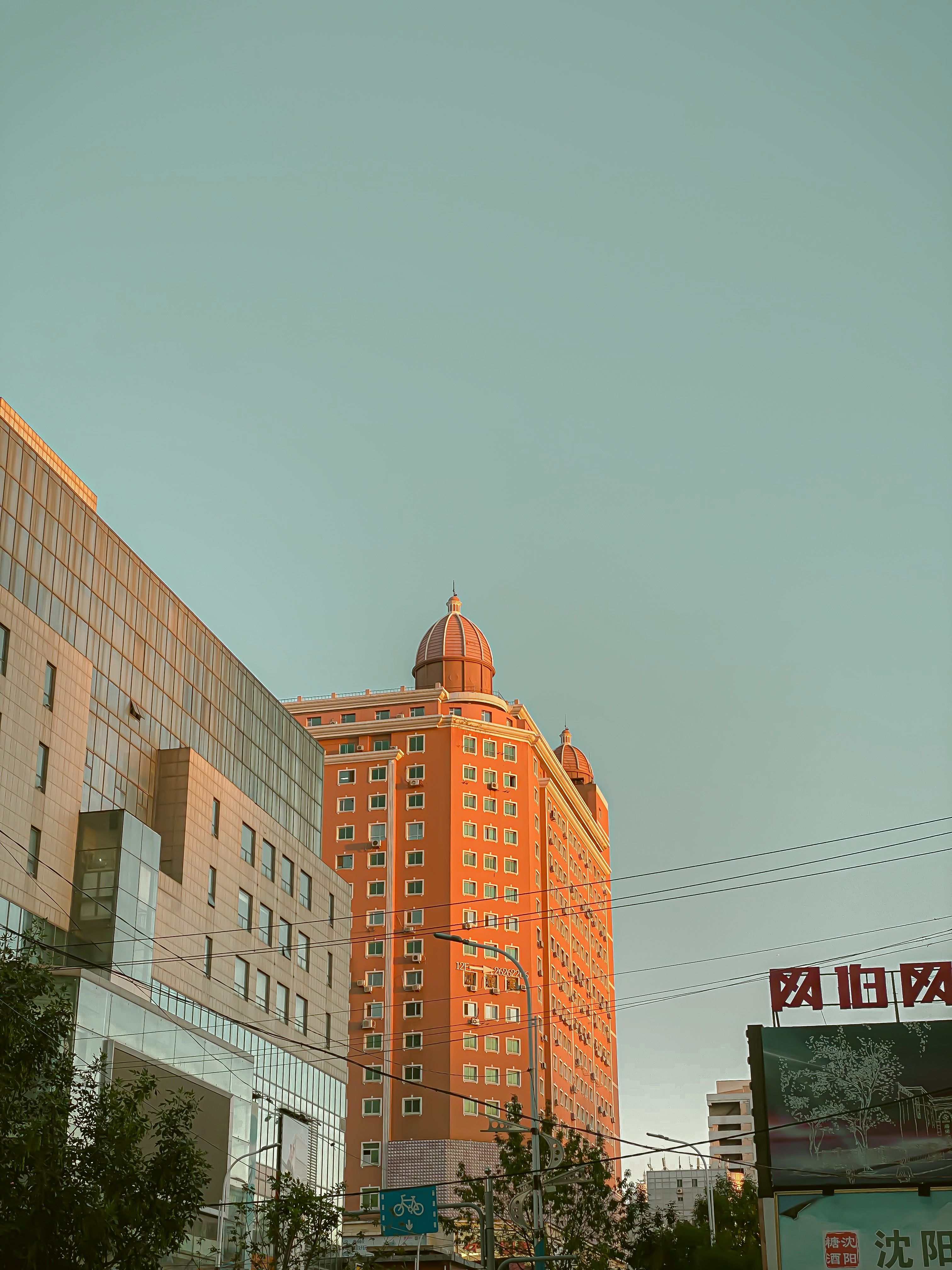 Tall Building Topped with Towers with Domes · Free Stock Photo