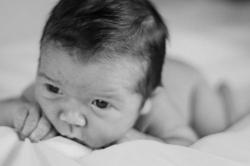 Baby Lying Down in Black and White