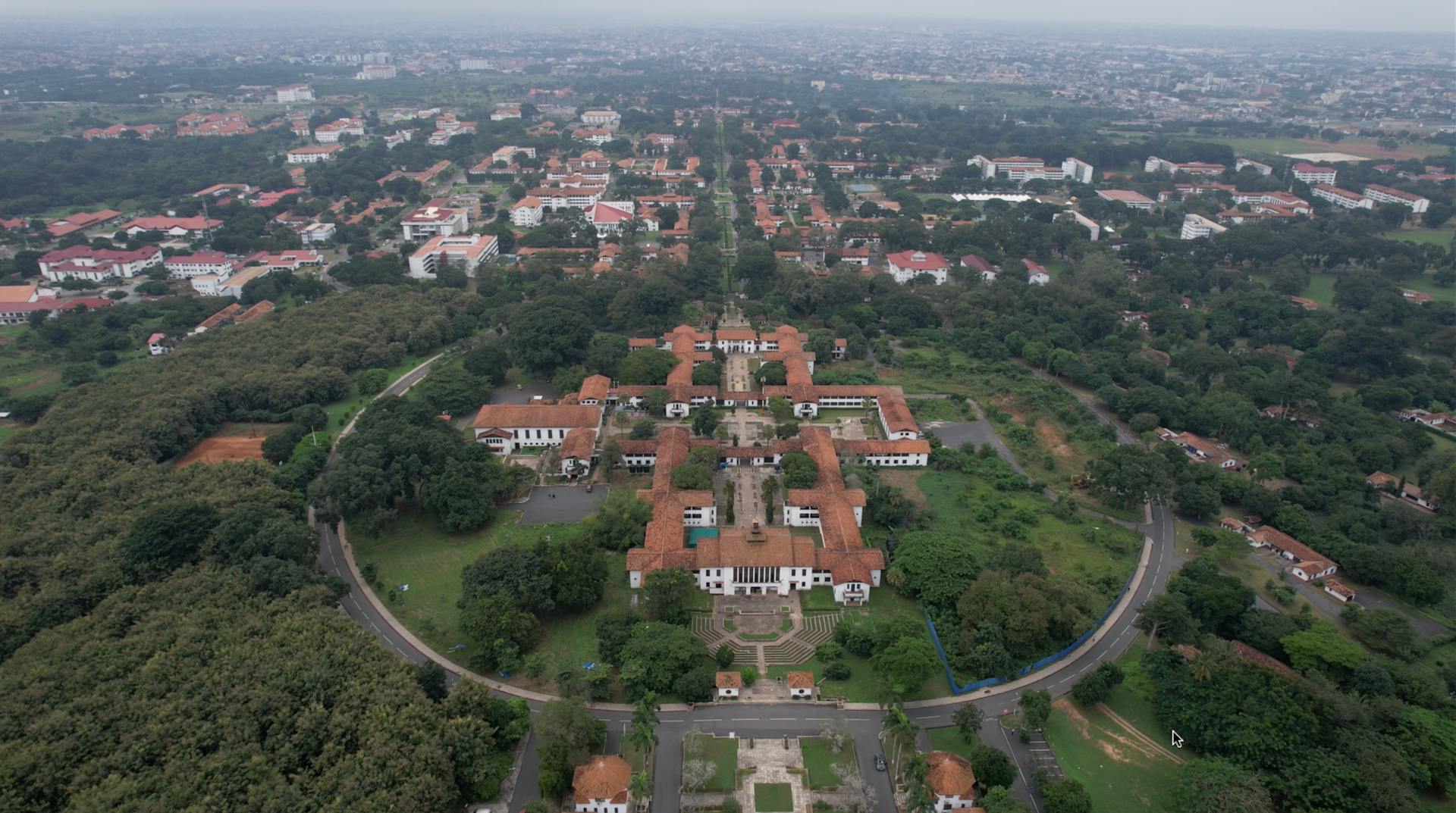 Stunning aerial view of the University of Ghana campus in Accra with lush greenery and buildings.