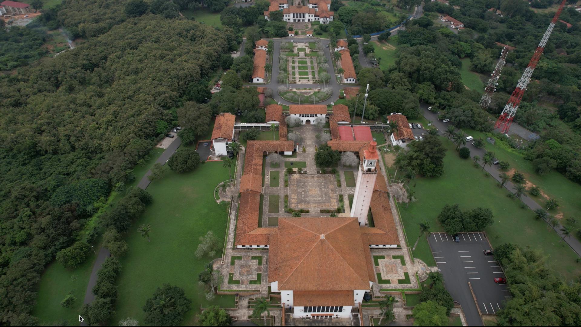 A stunning drone view of a lush university campus in Accra, Ghana during summer.