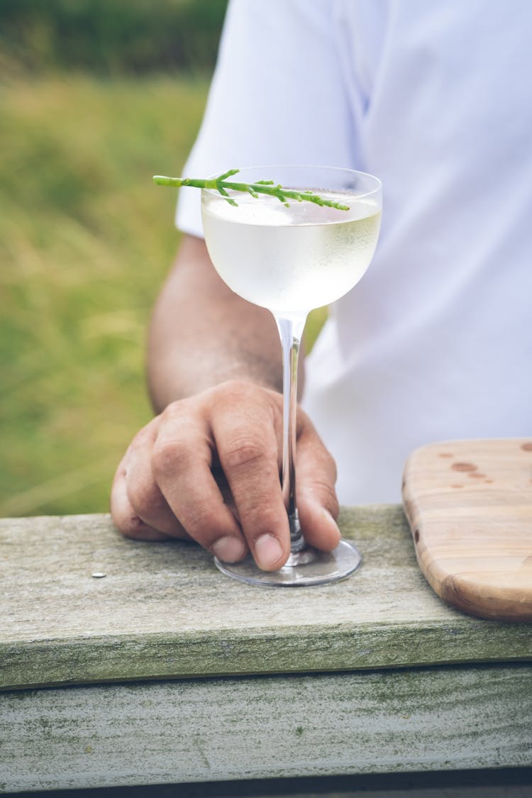 Man Hand Holding Glass With Cocktail