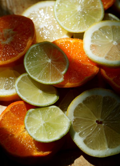 Free Close-up of colorful citrus slices including lemons, limes, and oranges, showcasing freshness and juiciness. Stock Photo