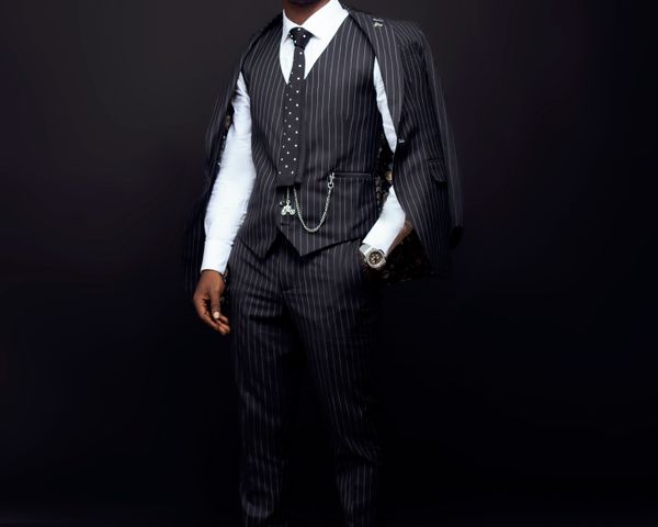 Man in pinstripe suit with formal waistcoat
