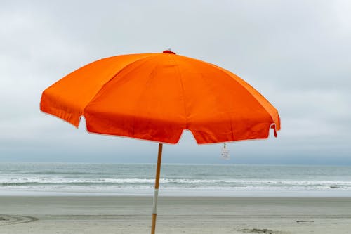 Beach Umbrella against Vast Sea