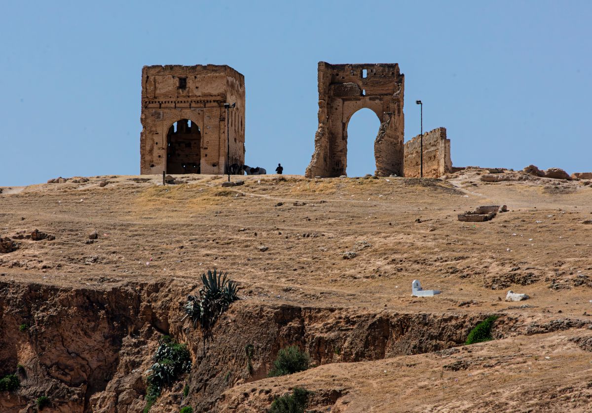 Explore the historic Marinid Tombs in Fes, Morocco, showcasing ancient architecture on a sunny day.