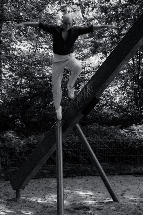 Men Balancing Man Balancing on Metal Support · Free Stock Photo