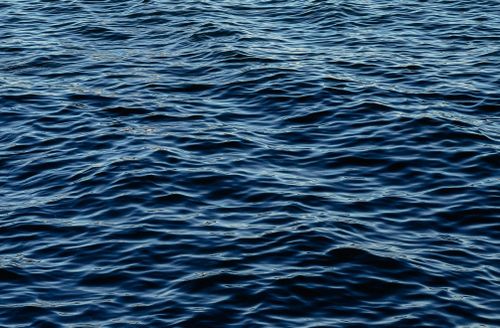 Free Calm waves of the Caspian Sea showcasing intricate water textures in Baku, Azerbaijan. Stock Photo