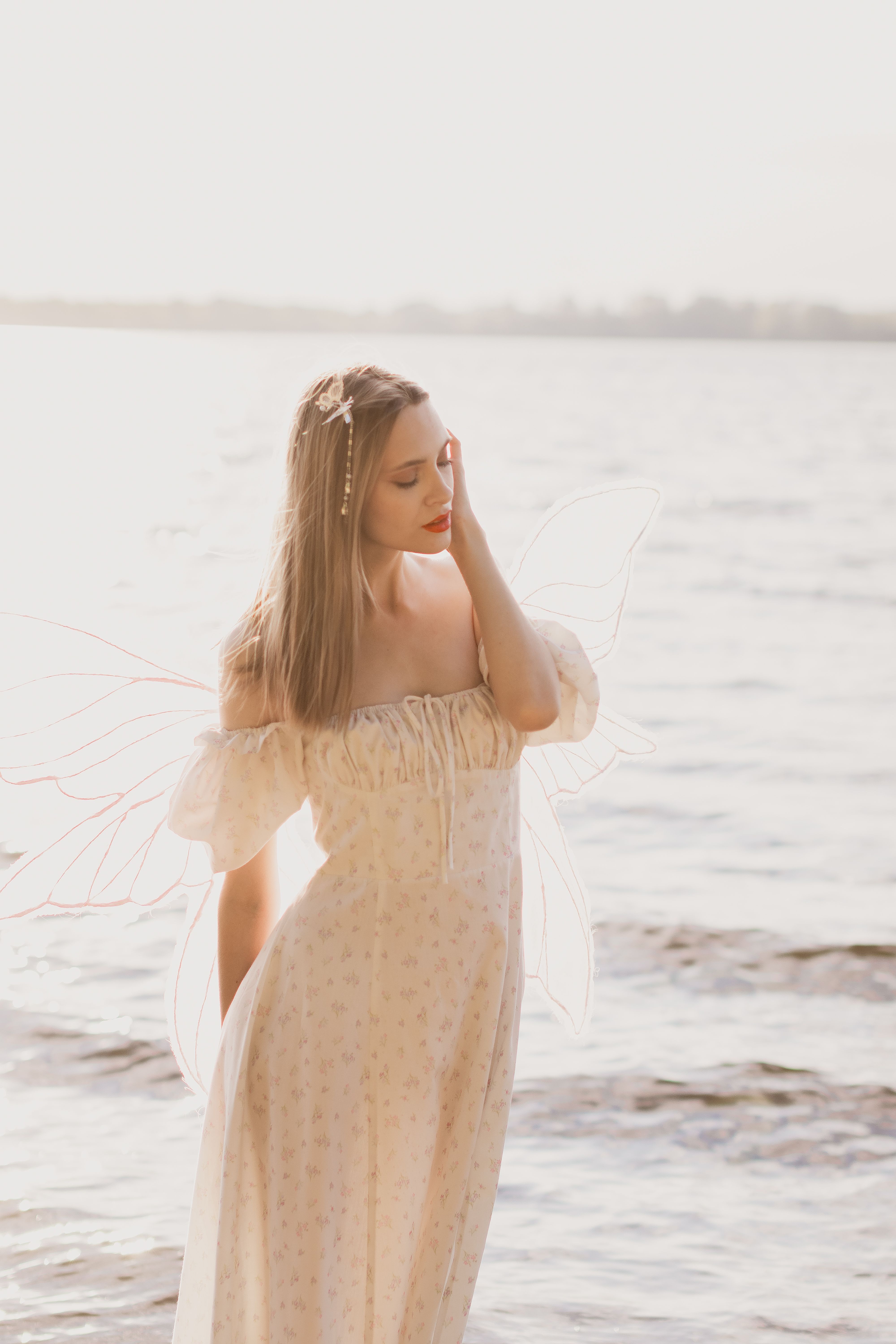 Attractive Woman in a Summer Dress Standing on the Beach · Free Stock Photo