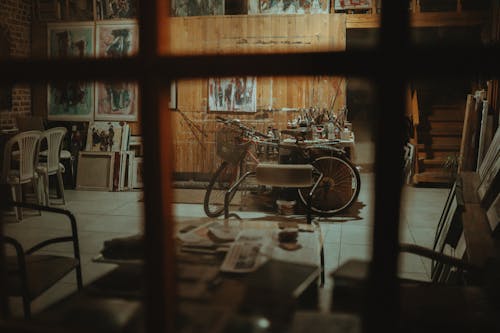 Bike and Paintings in Room