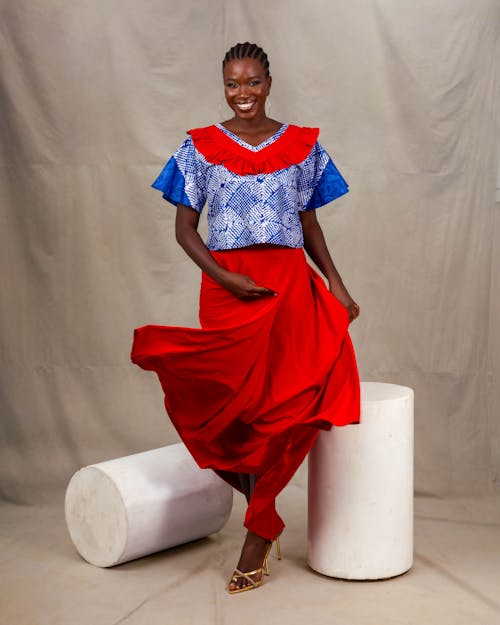 Model in a Red Maxi Skirt and a Blue Blouse