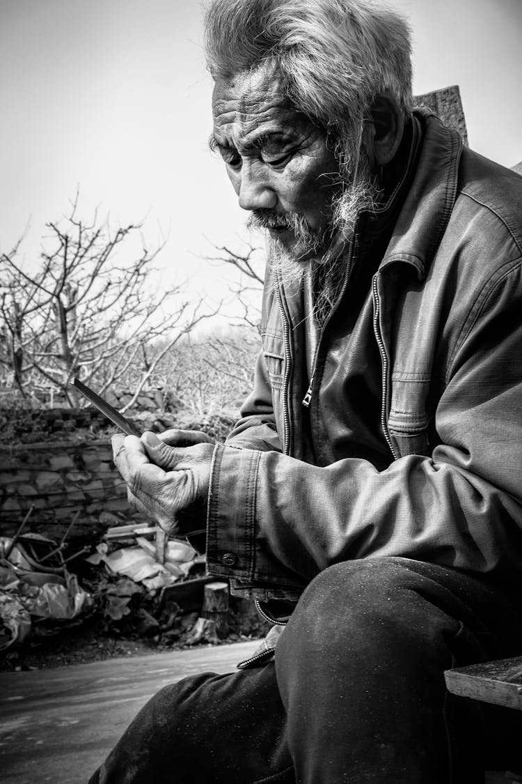 Elderly Man In Jacket