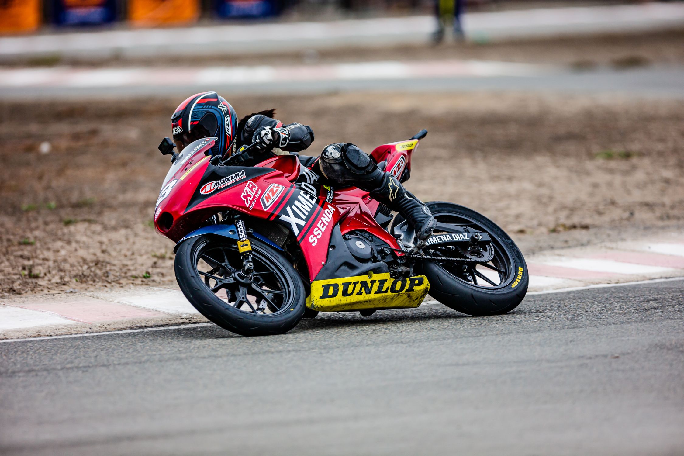 Rider on Motorbike on Racing Circuit · Free Stock Photo