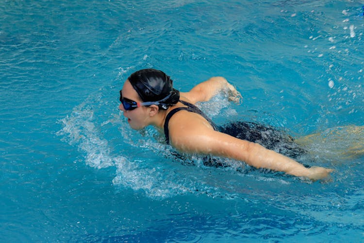 Woman Swimming In Training