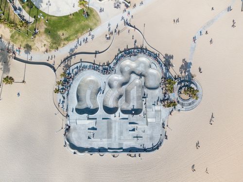 Free Top view of Venice Beach skatepark with people and sand in Los Angeles. Stock Photo