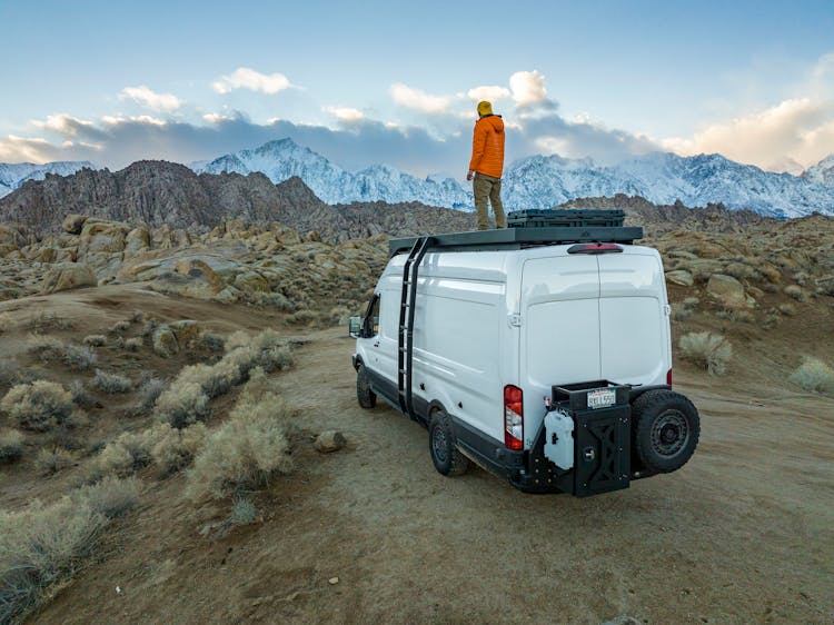 Man Standing On Ford Transit