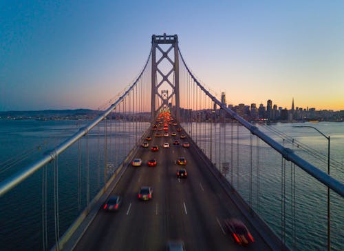 Kostnadsfri bild av bilar, Golden Gate-bron, kväll