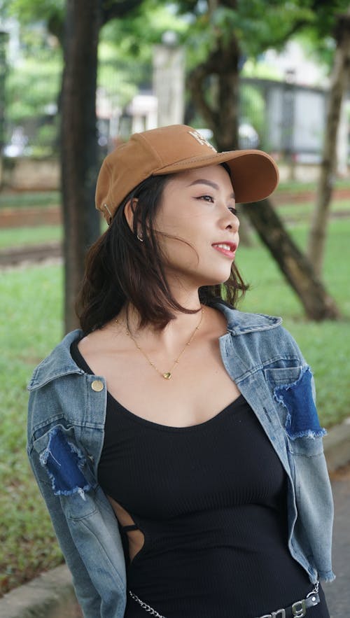 Portrait of Woman in Cap and Jean Jacket