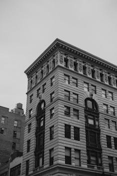 Iconic New York City architecture captured in monochrome, highlighting urban design.