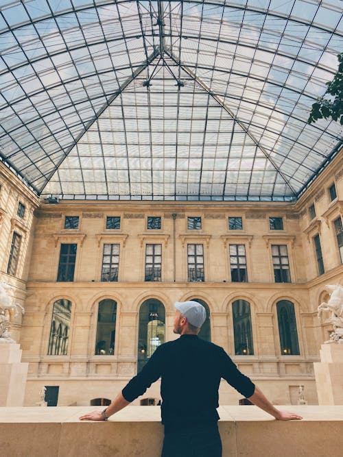 Man Standing in Louvre