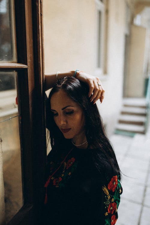 Brunette Woman Looking Down