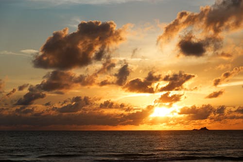 Ingyenes stockfotó felhők, naplemente, part témában