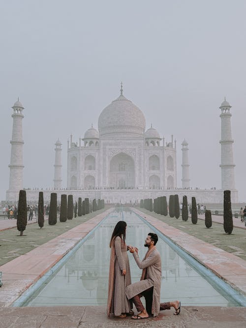 Man Proposing to a Woman in front of the Taj Mahal Palace, India 