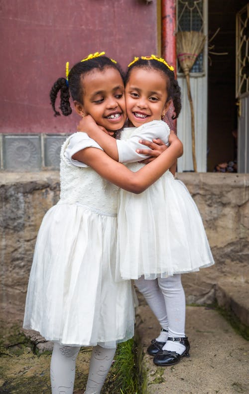 Photo of Two Girls Hugging 