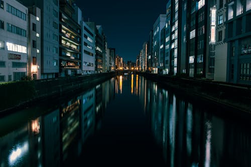 Buildings around Canal in Tokyo at Night
