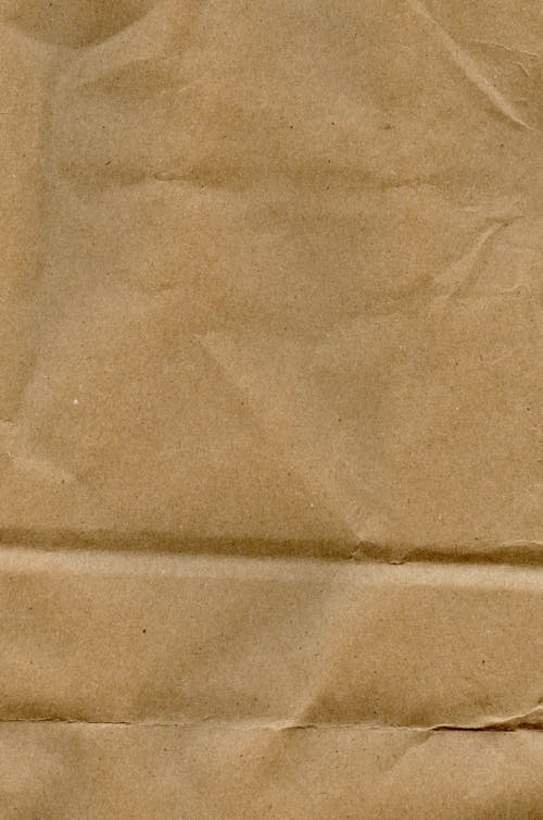 Бесплатное стоковое фото с бумага, вертикальный выстрел, коричневый