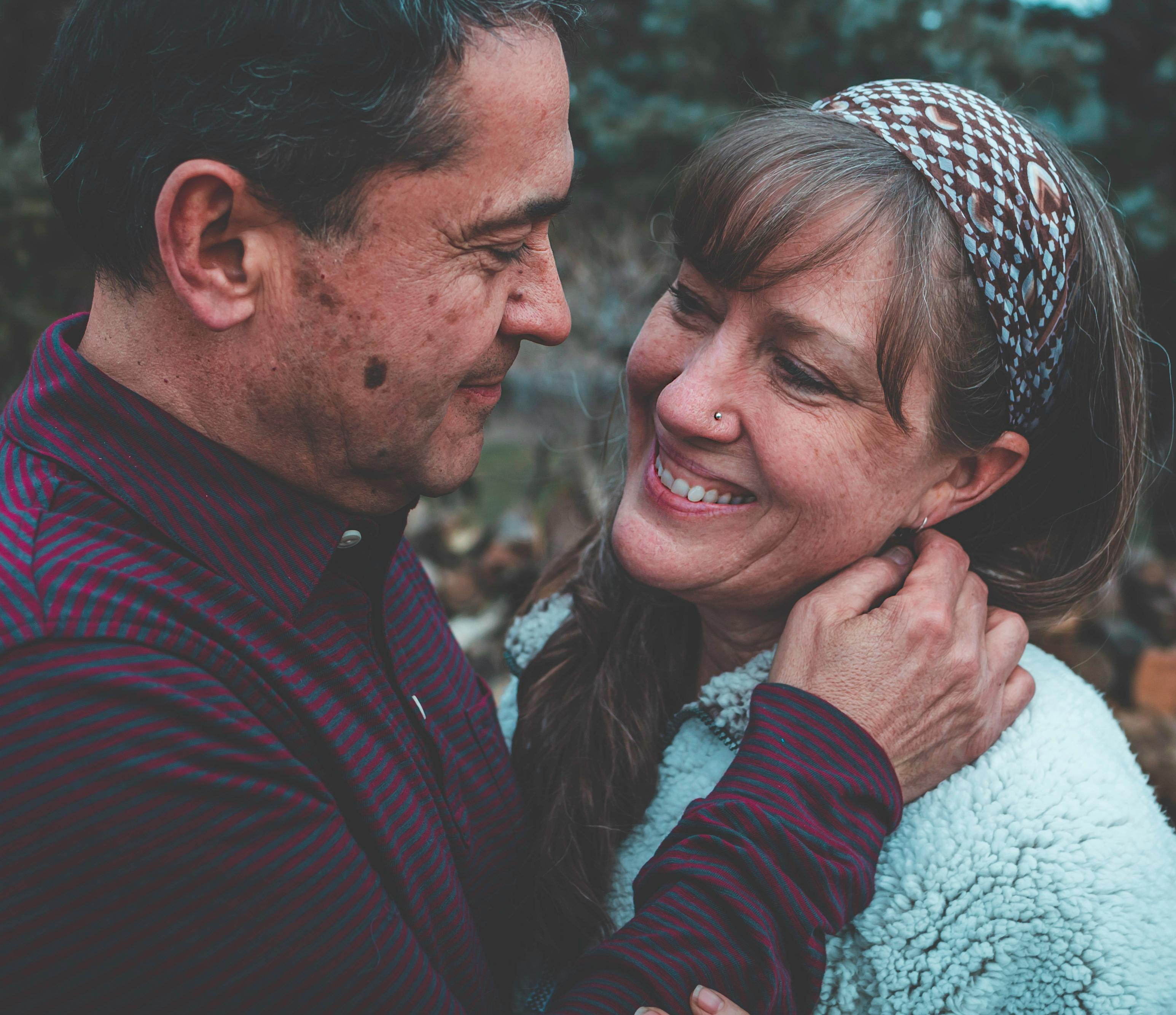 man looking at woman s face