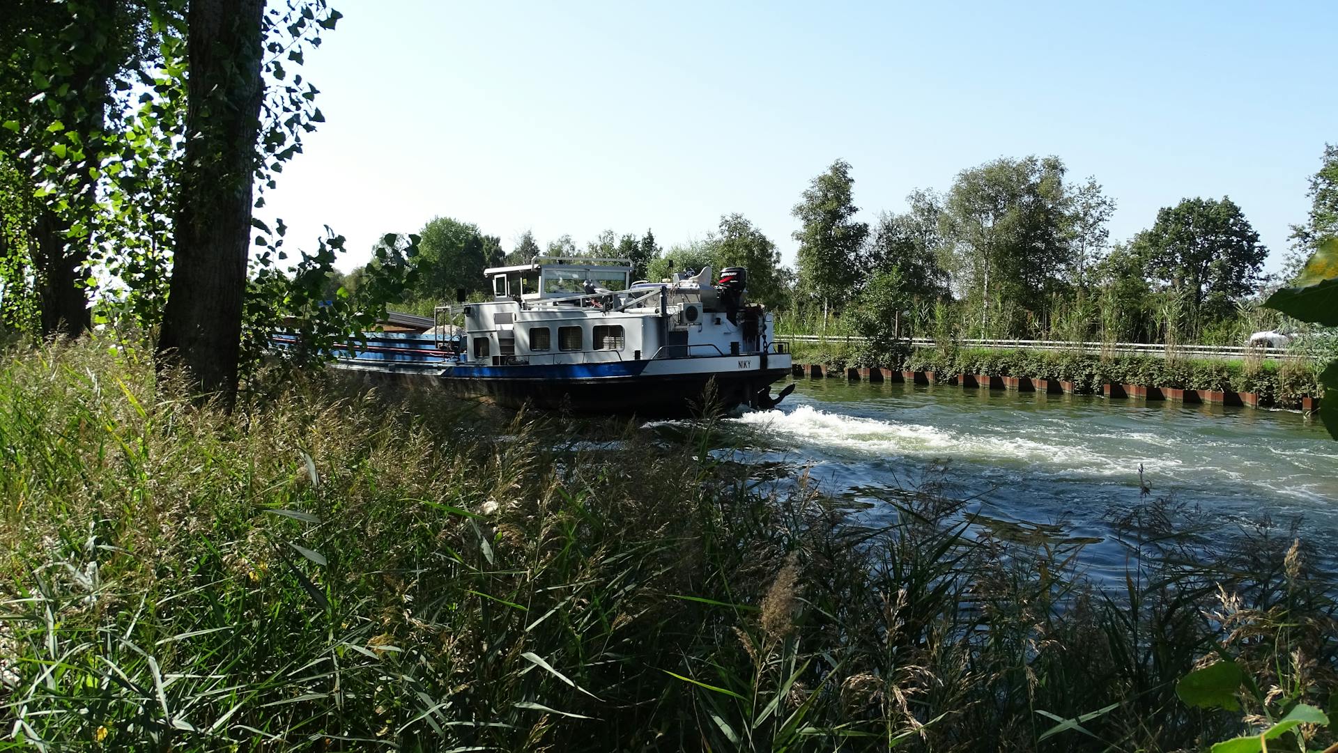 Barge Sailing on River
