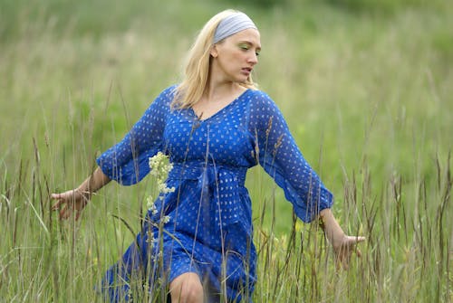 Blonde Woman in Blue Dress