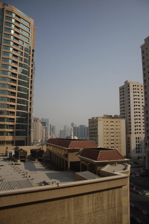 Foto profissional grátis de apartamentos, edifícios, mesquita sharjah