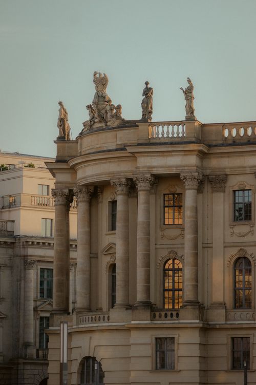 Free Elegant neoclassical facade of Humboldt University in Berlin at sunset. Stock Photo