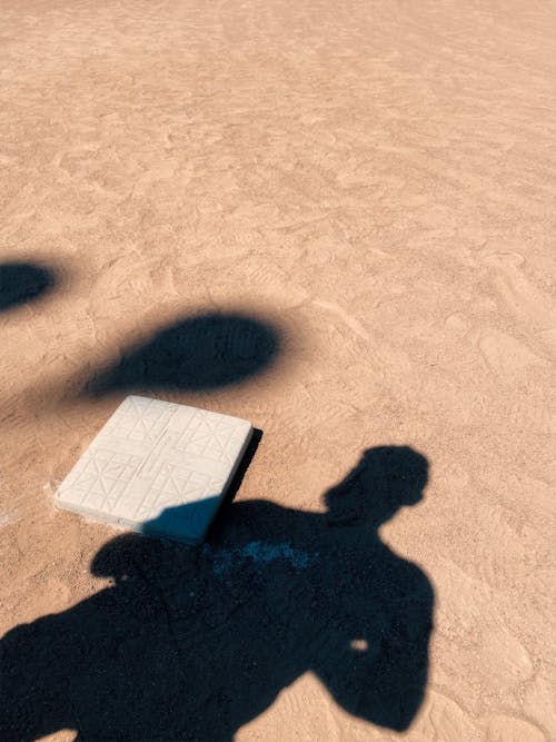 Shadow of a Man on a Sandy Surface