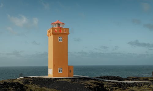 Ochre Colored Svortuloft Lighthouse in Iceland