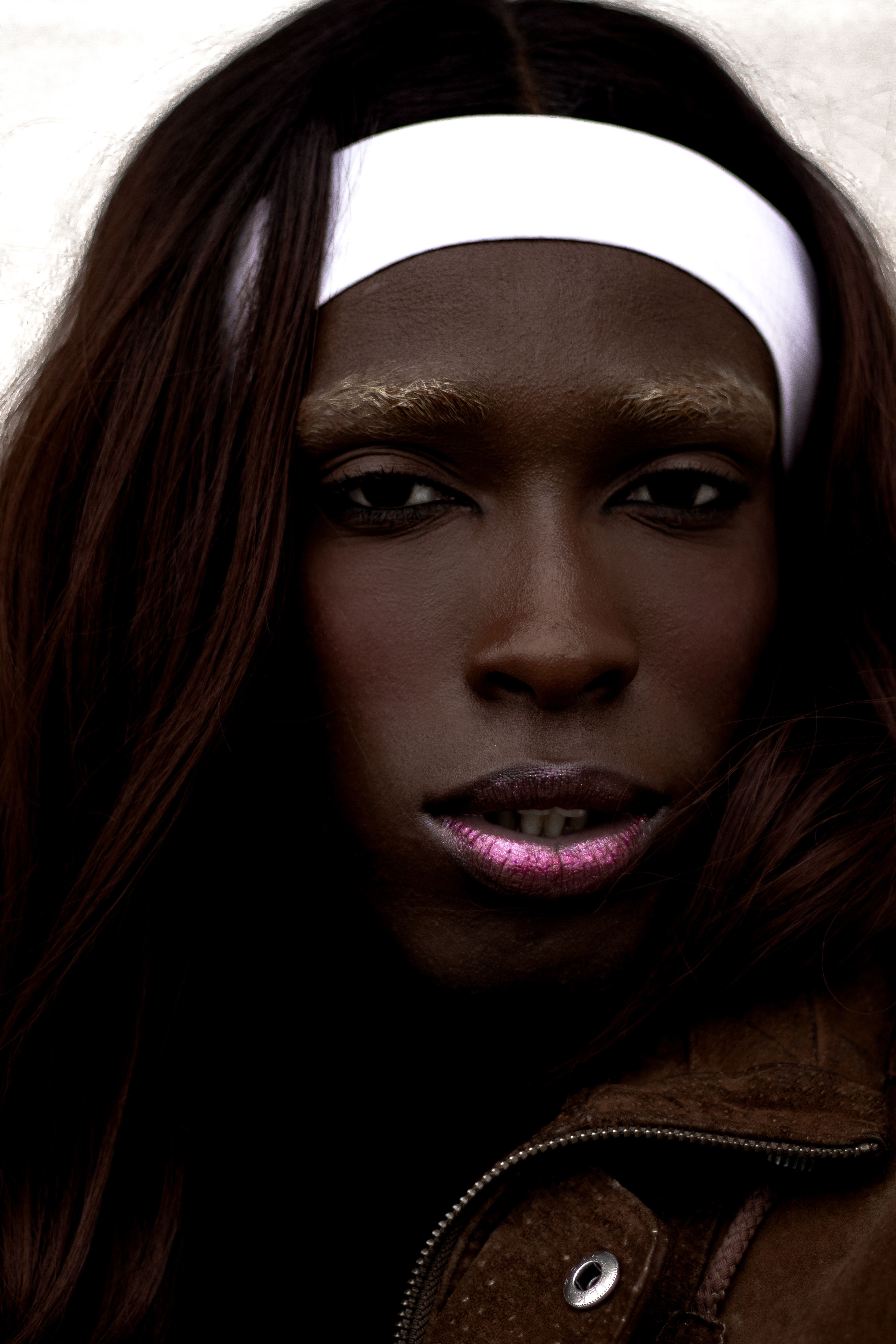 Close-up portrait of a fashionable model with unique style in Rio de Janeiro, Brazil.