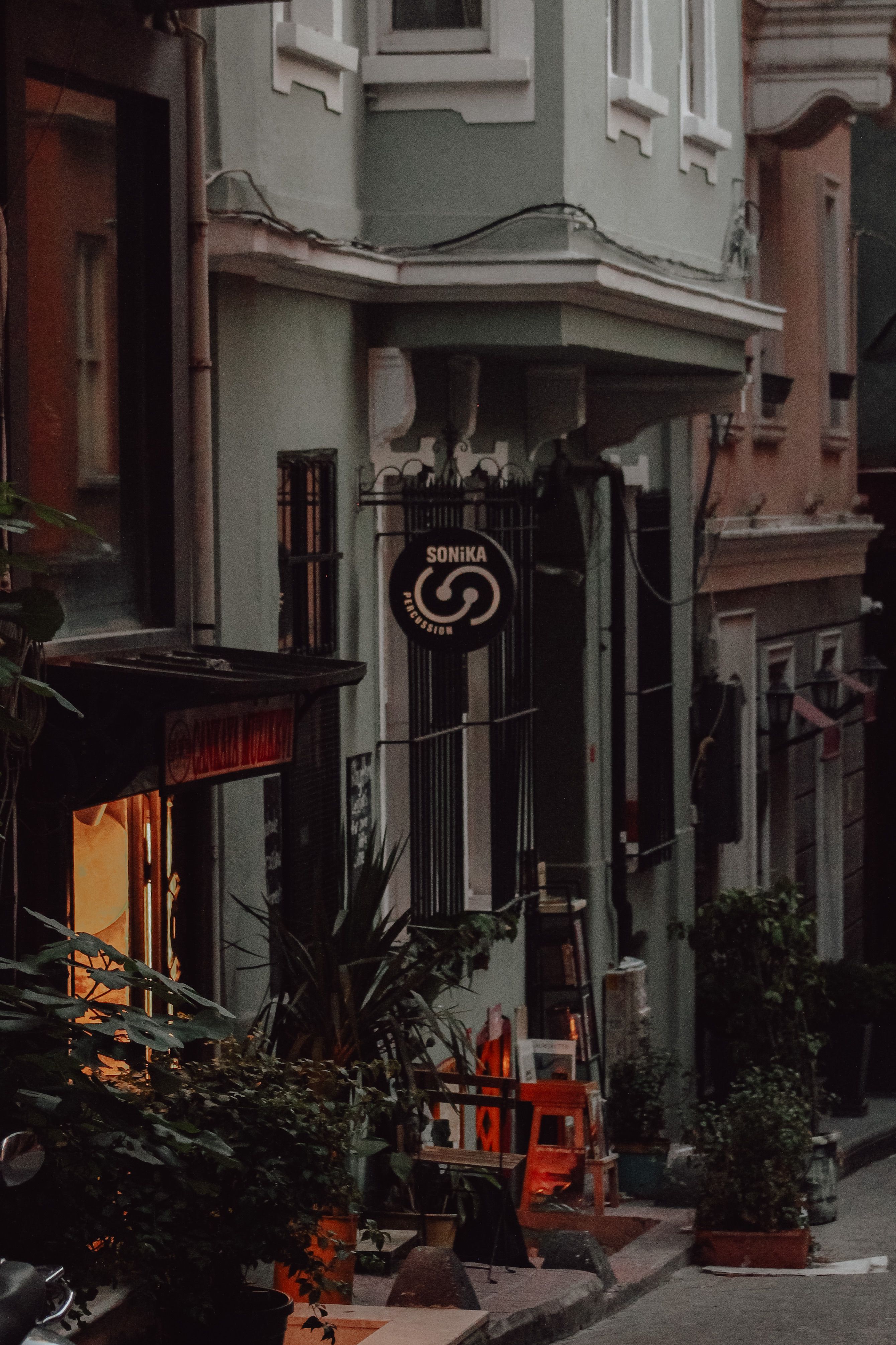 Explore the cozy ambiance of Istanbul's historic streets with vintage architecture and vibrant urban life.